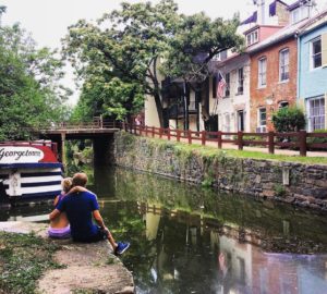 A couple relaxing along the C&O Canal in Georgetown